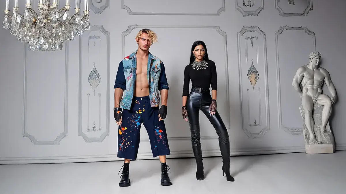 Fashion models in bold outfits in white room with statue