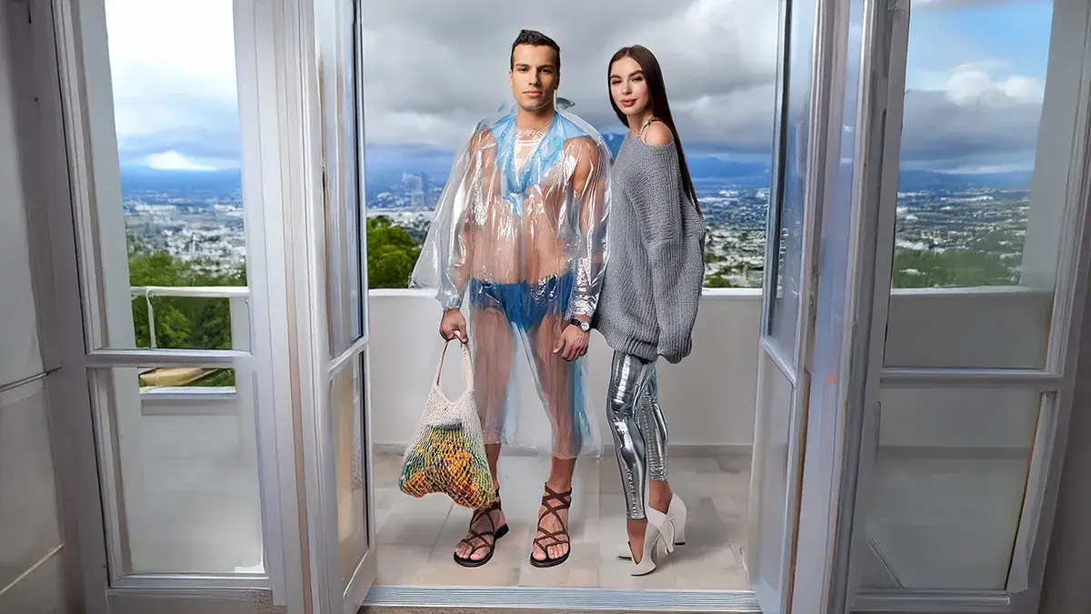Fashion models against misty mountain view
